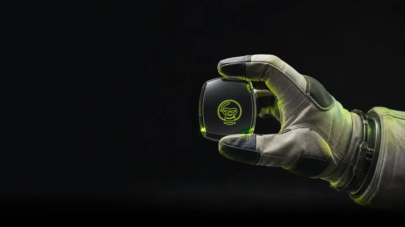 Astronaut hand holding an Artchunk device